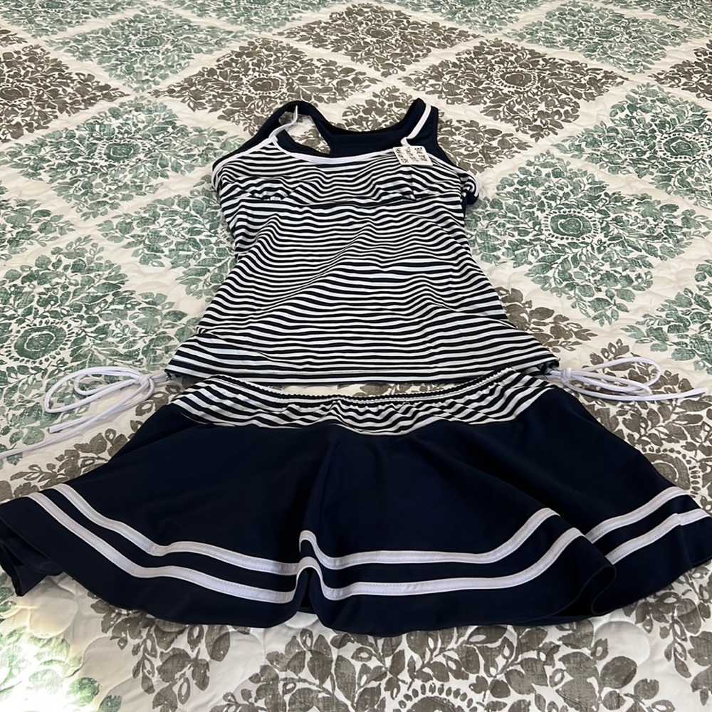 Bathing suit size medium with a swim skirt